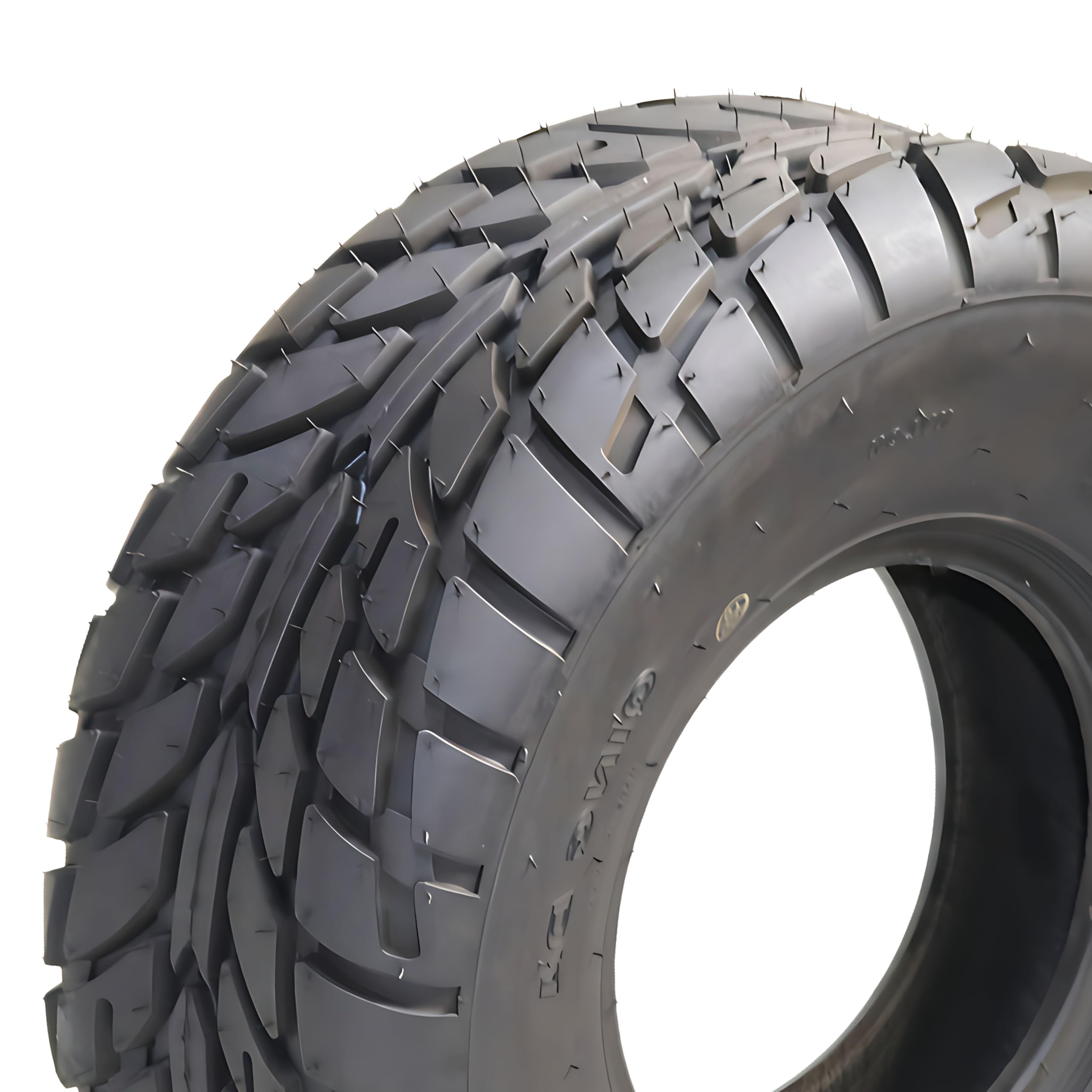 Close view of the directional tread and shoulder lugs on a 16x8-7 ATV tire