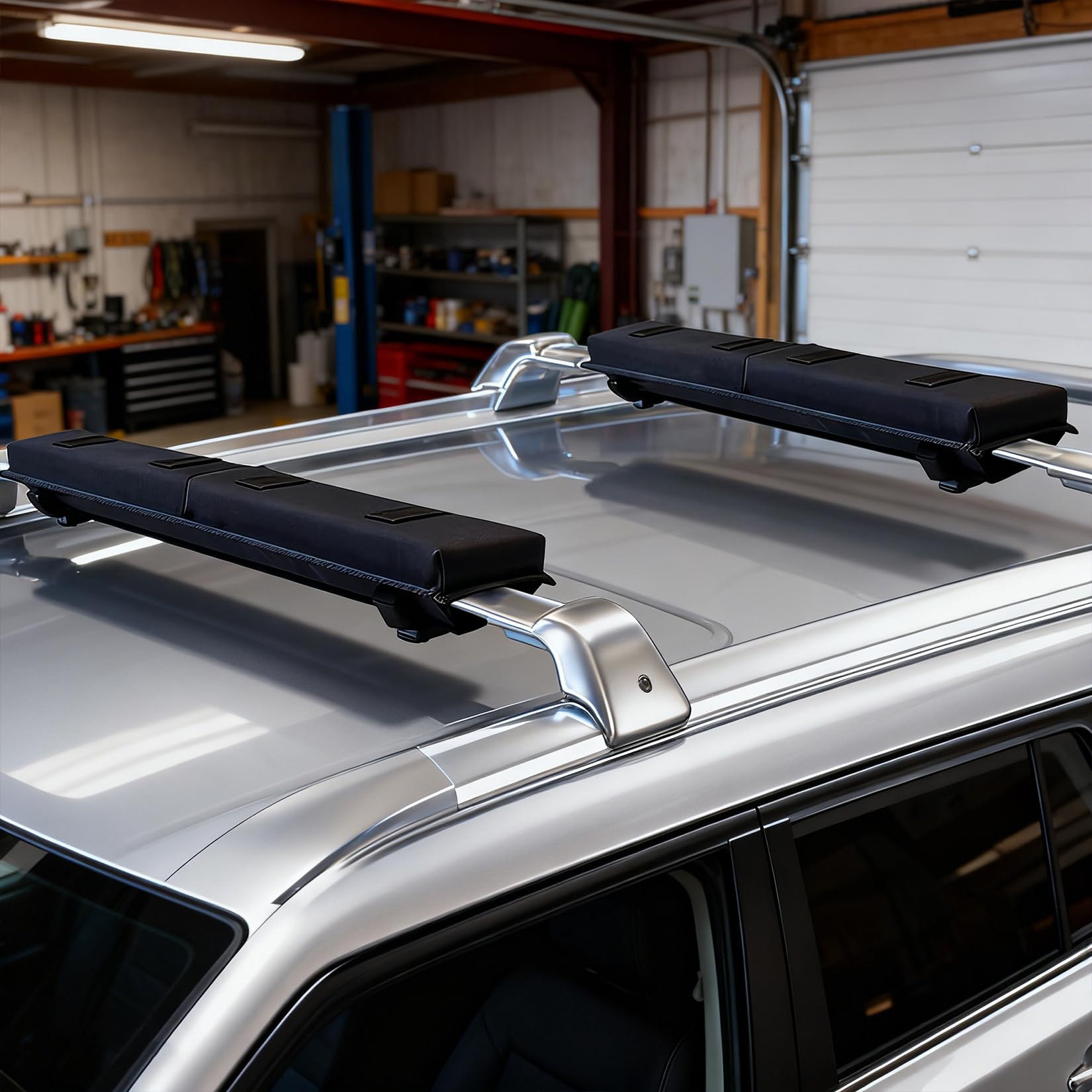 Black 30.5" roof rack pads secured around vehicle crossbars