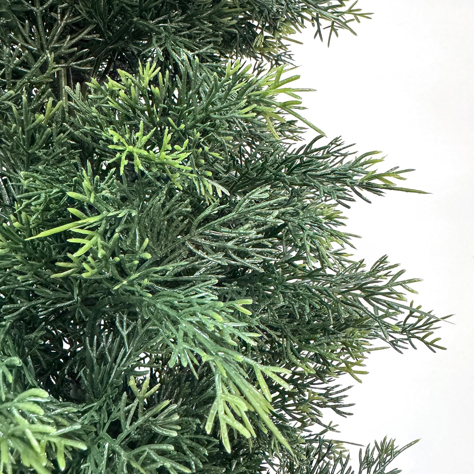 Close-up of cedar-like artificial foliage texture