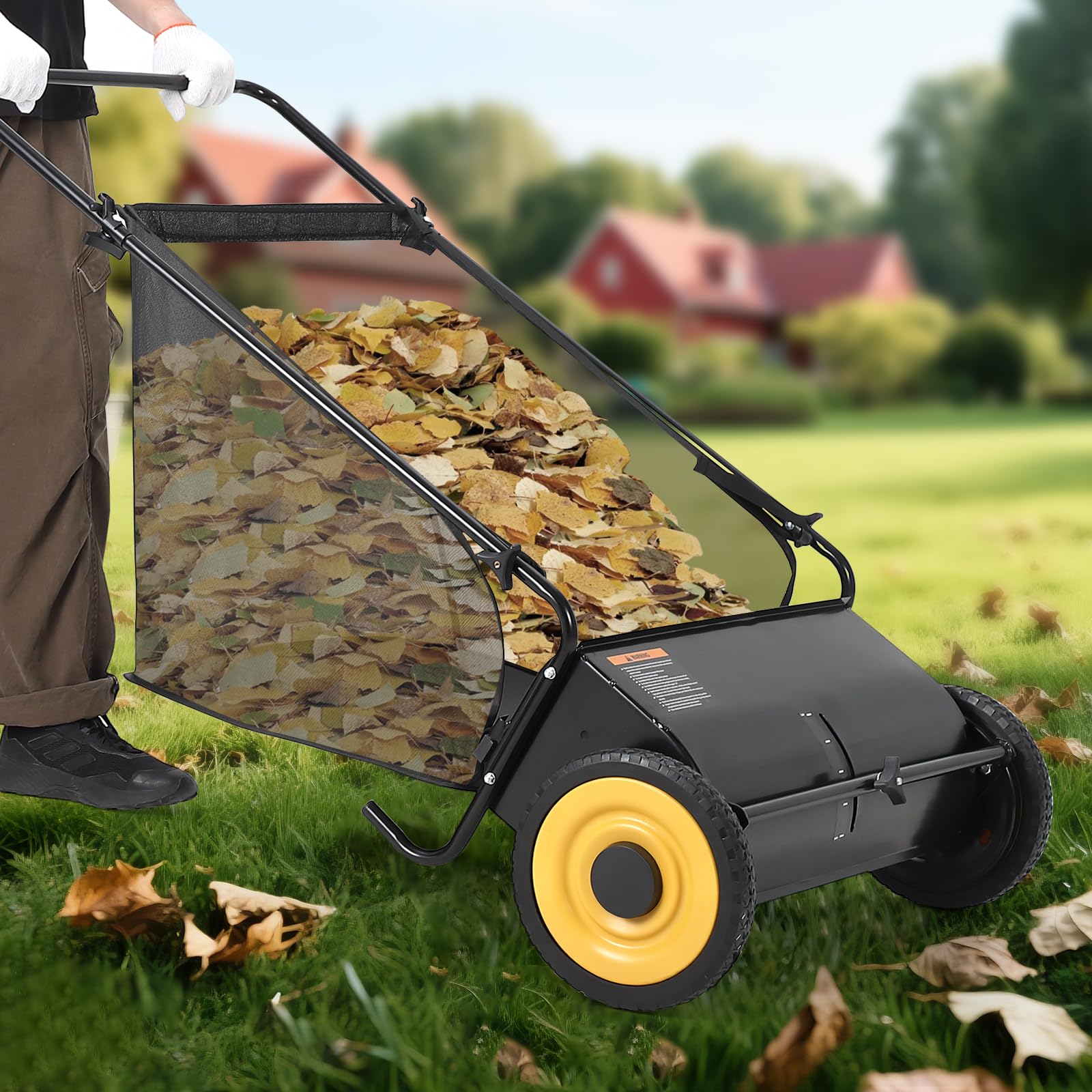 Garvee lawn sweeper with large leaf-filled collection bag