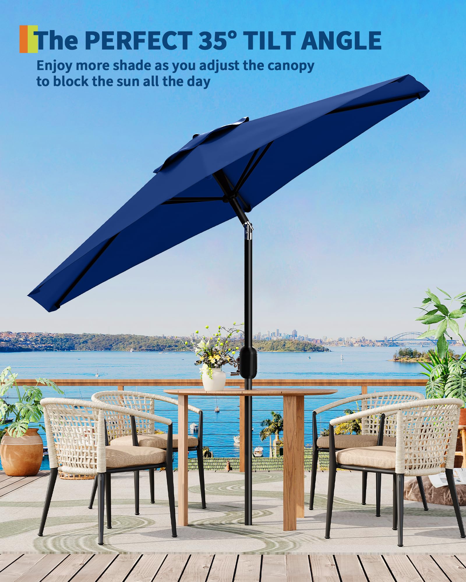 Navy patio umbrella tilted to a 35 degree angle over an outdoor table