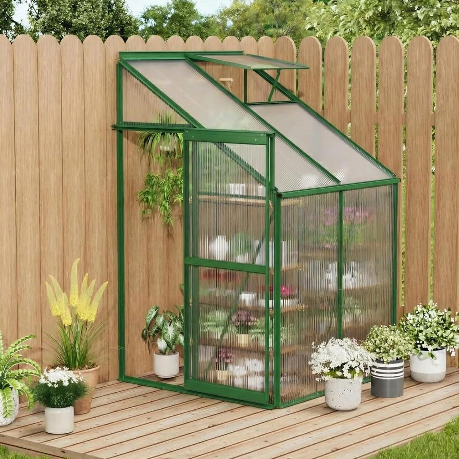 Green 4 x 4 ft polycarbonate greenhouse for compact outdoor growing spaces