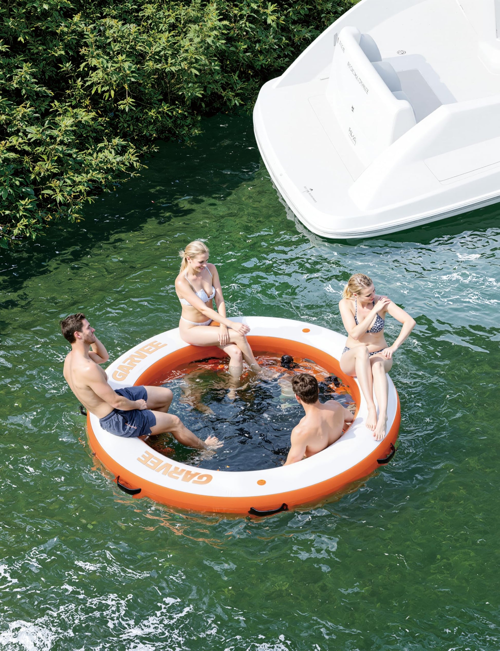Garvee inflatable water hammock floating with a group on the lake
