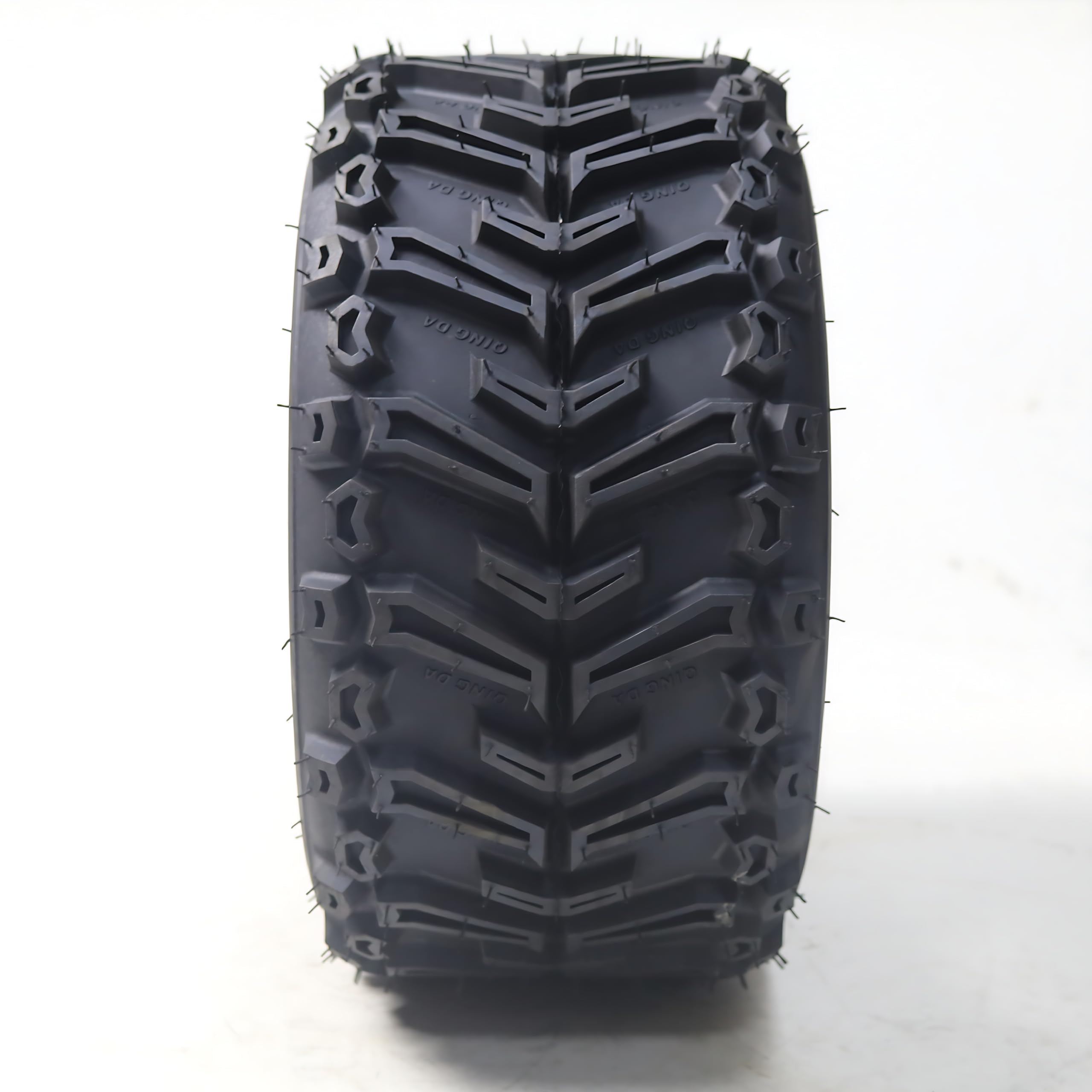 Front view of directional tread blocks on a 16x8-7 ATV tire