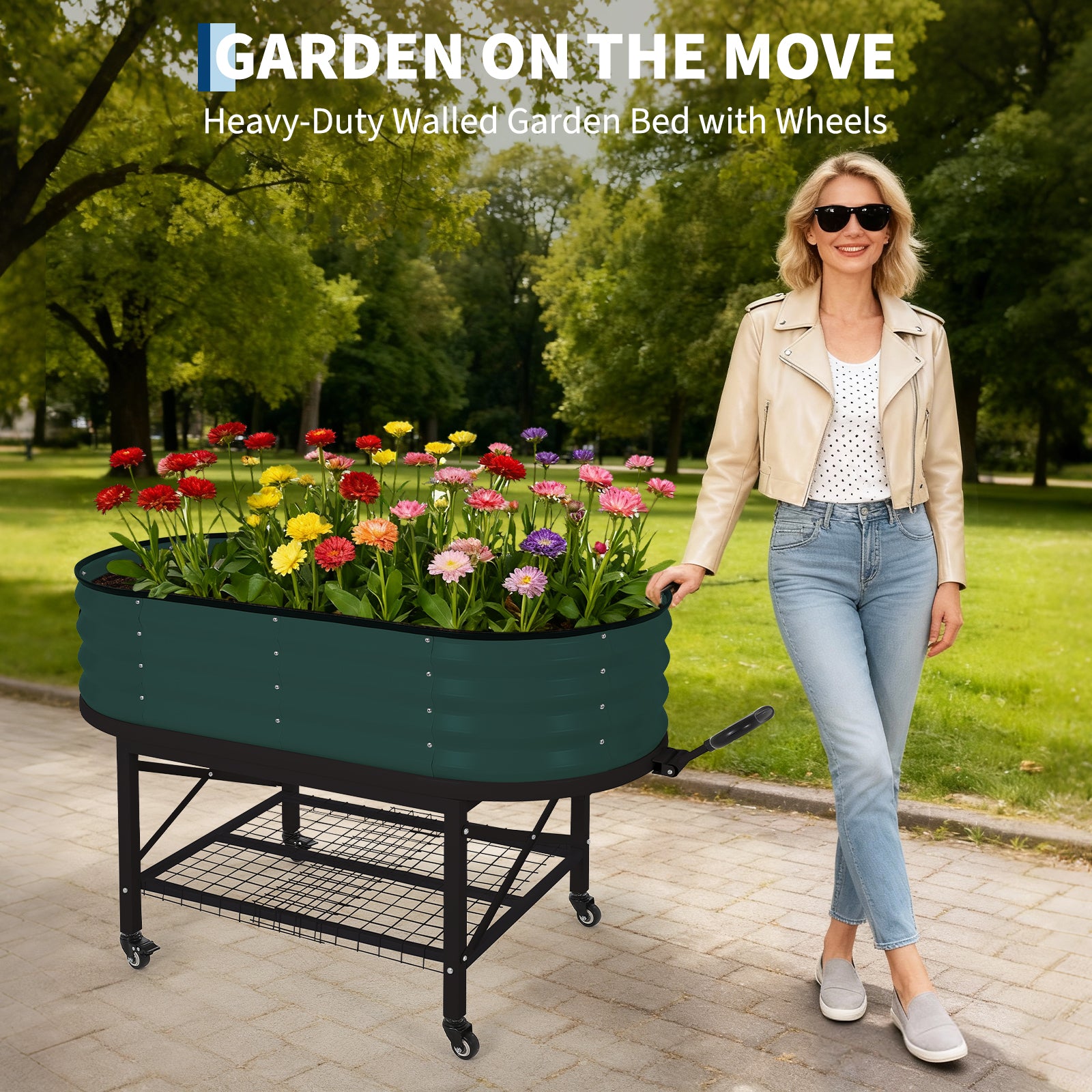 Dark green mobile oval raised garden bed being moved with a pull handle and caster wheels