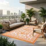 Garvee Waterproof Reversible Outdoor Rug 8x10ft - Botanical Cottagecore Plastic Straw Patio Mat - UV Resistant, Lightweight, Collapsible - Perfect for Patio, Deck, RV, Camping, Porch, Balcony, Backyard, Picnic, Beach - Orange/White, USA - Orange & White